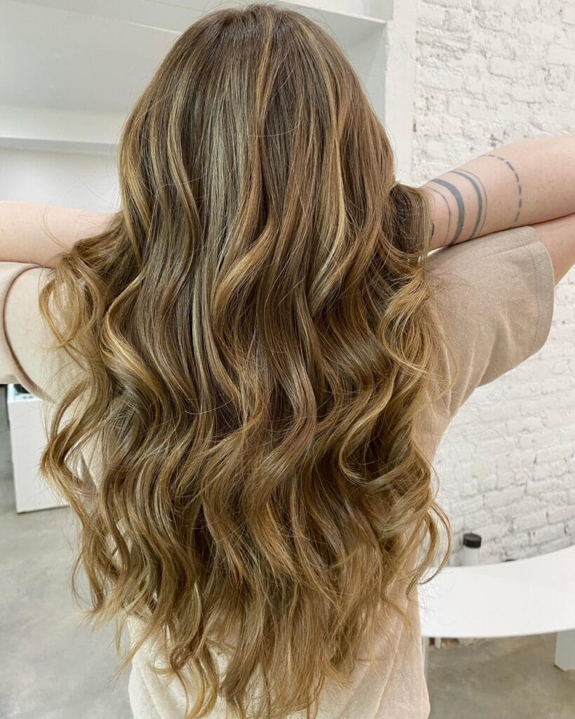 Highlights NYC long curly blonde specialist hair Color And Andy Bowery hair salon
